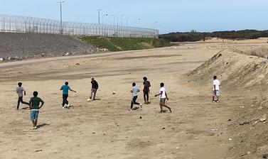 Children playing football. 