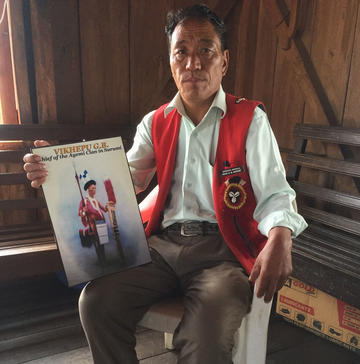 Qheniho Jakhalu with portrait of Vikhepu Ayemi from The Sema Nagas (Hutton, 1921) (Surumi, 19.2.2022; photo: Christian Poske Qheniho Jakhalu with portrait of Vikhepu Ayemi from The Sema Nagas (Hutton, 1921) (Surumi, 19.2.2022; photo: Christian Poske